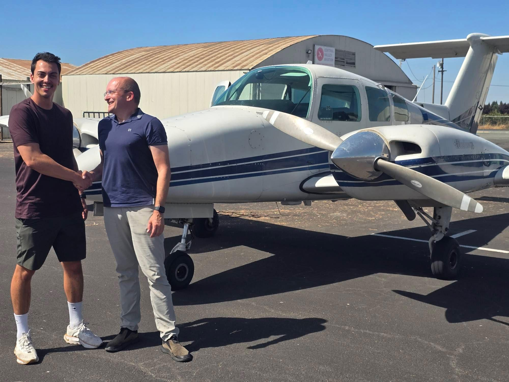 Flight instructor teaching student pilot in cockpit – Flight School vs Independent Instructor comparison at CFI Academy